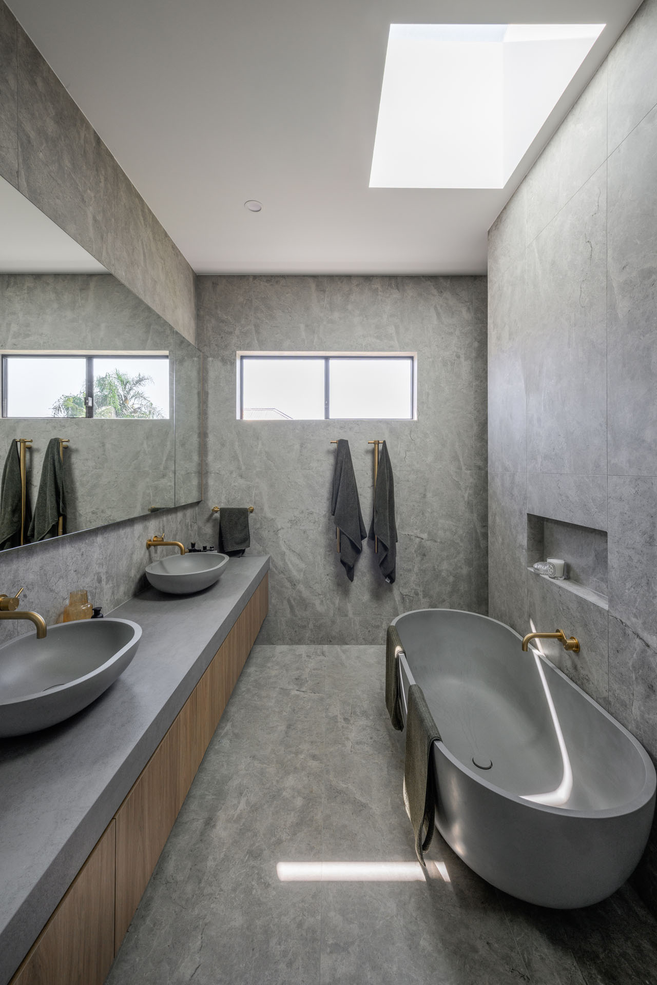 His & Hers Vanity — large-format grey tiled bathroom
