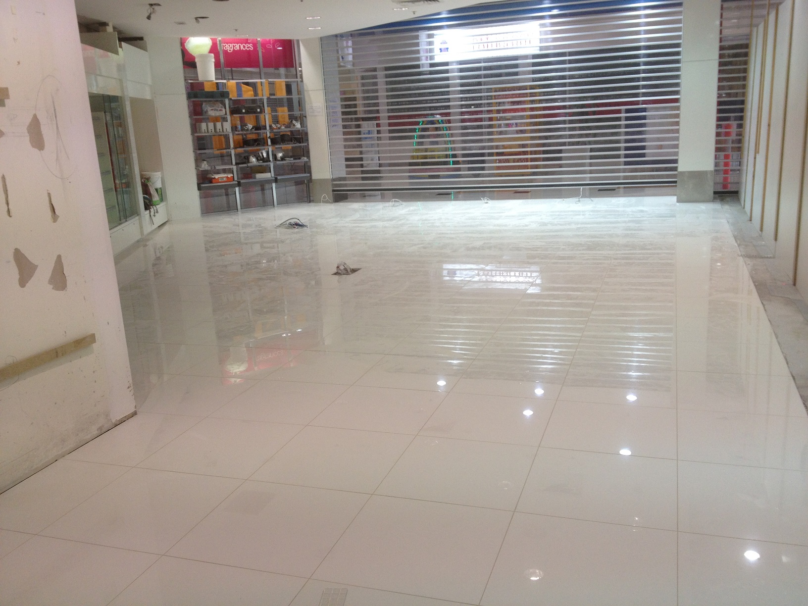 Large commercial retail floor tiled by ID Tiling